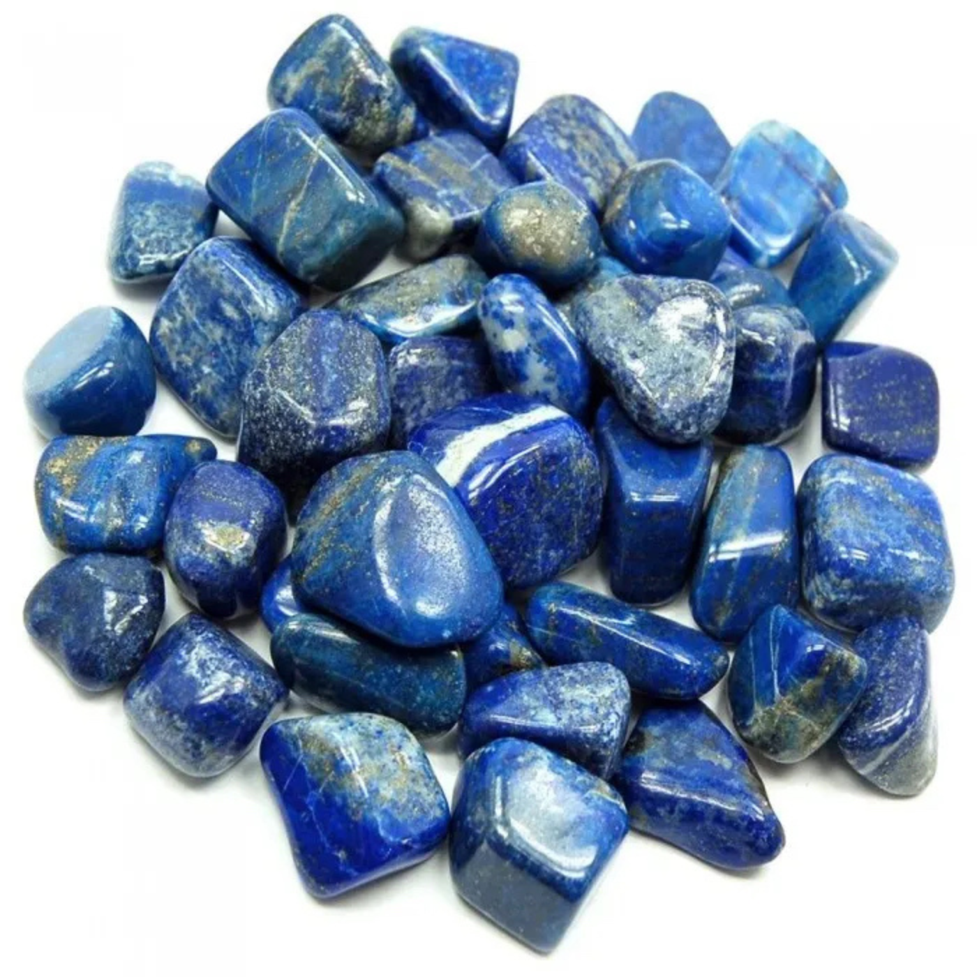 Blue lapis lazuli gemstones on a white background